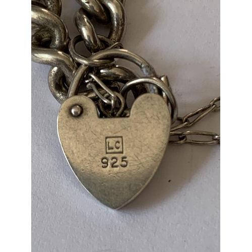 566 - A SILVER PADLOCK BRACELET