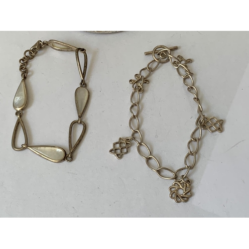 594 - TWO SILVER BRACELETS AND A SILVER BANGLE