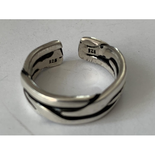 607 - A MATCHING SILVER BANGLE AND RING SET