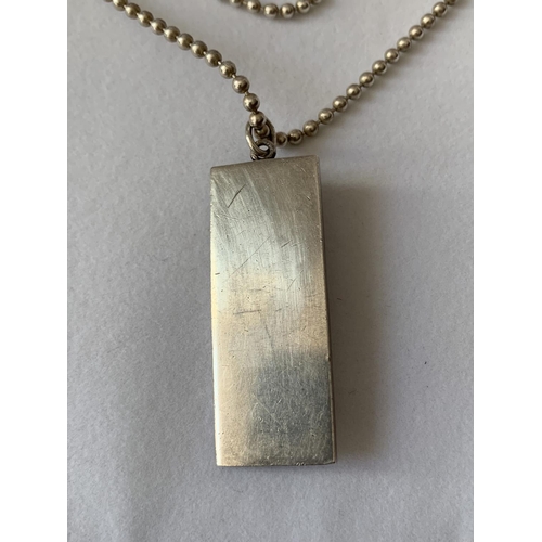 615 - A SILVER INGOT IN A PRESENTATION BOX