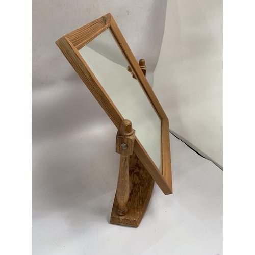 121 - A PINE FRAMED DRESSING TABLE MIRROR