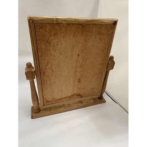 121 - A PINE FRAMED DRESSING TABLE MIRROR