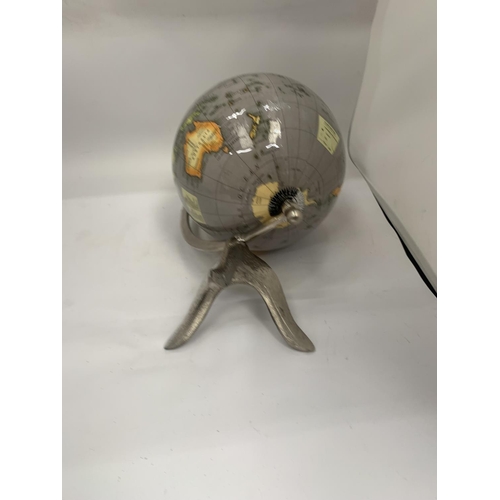 139 - A WORLD GLOBE ON A STAND