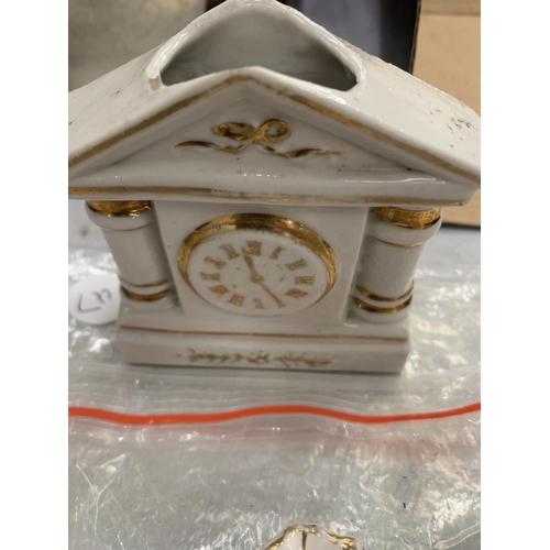 146 - FOUR CRESTED WARE CLOCKS