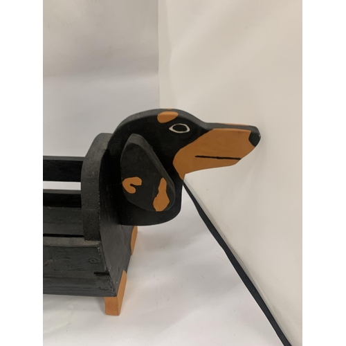 152 - A SAUSAGE DOG WOODEN PLANT HOLDER