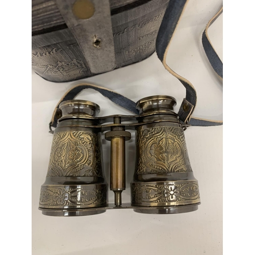 180 - A PAIR OF BRASS BINOCULARS IN A ROYAL NAVY CASE