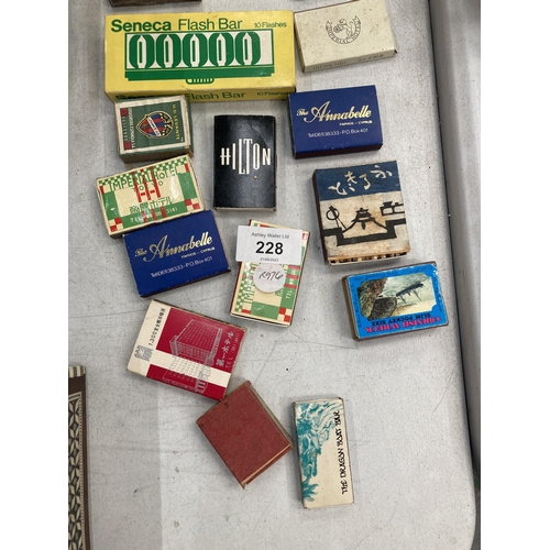 228 - A VINTAGE LOT OF ITEMS, TINS, PHOTOS AND MATCHSTICK BOXES