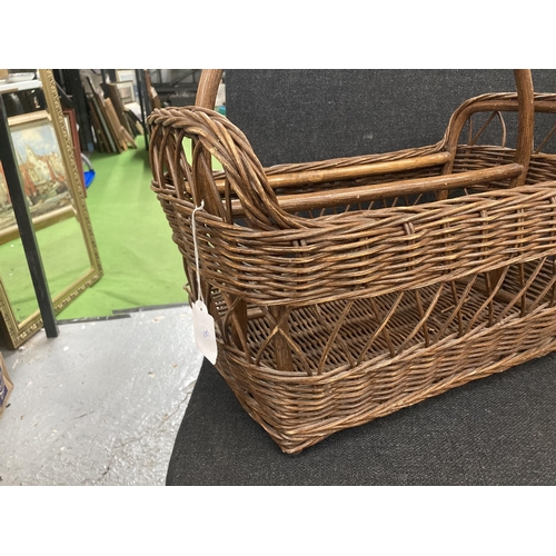 237 - A VINTAGE WICKER BASKET