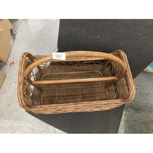 237 - A VINTAGE WICKER BASKET