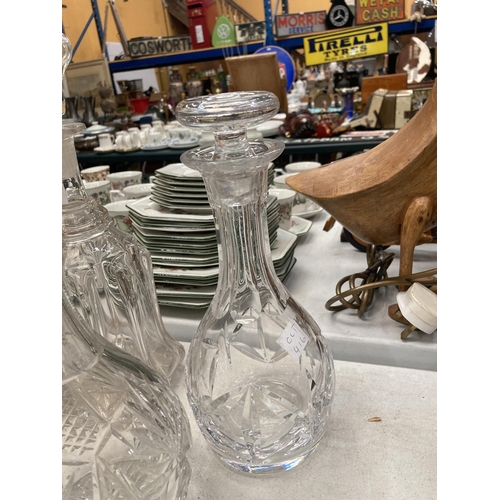 811 - A GROUP OF THREE VICTORIAN AND LATER DECANTERS