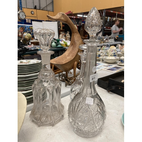 811 - A GROUP OF THREE VICTORIAN AND LATER DECANTERS