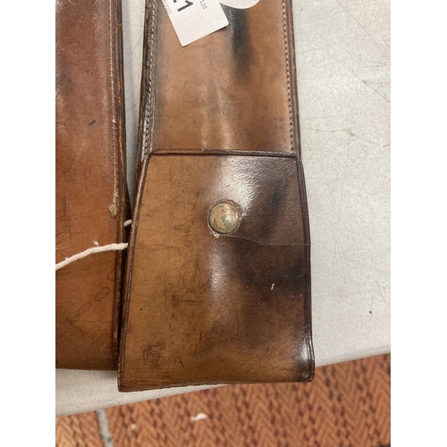 821 - TWO VINTAGE LEATHER HOLDERS