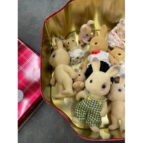 243A - A GROUP OF SYLVANIAN FAMILY TOYS