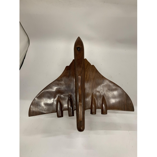 3 - A LARGE WOODEN VULCAN BOMBER ON CHROME STAND