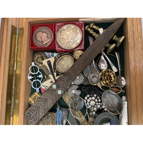 30 - A WOODEN AND GLASS DISPLAY CASE OF ASSORTED COLLECTABLE ITEMS