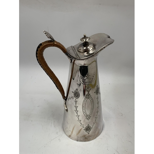 34 - A VINTAGE SILVER PLATED WATER JUG