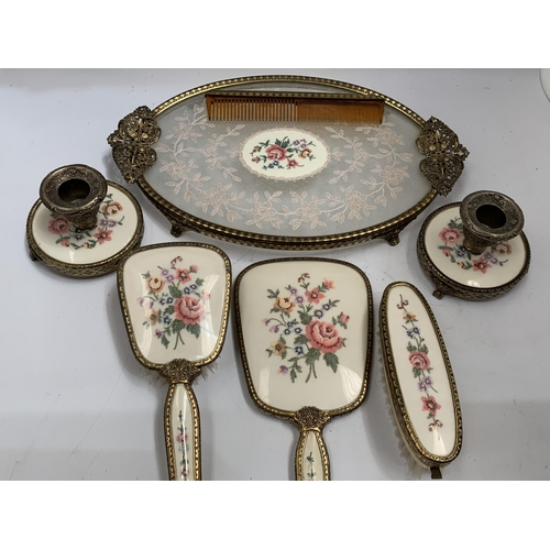 42 - A VINTAGE FLORAL EMBROIDERED DRESSING SET WITH TRAY AND CANDLESTICKS ETC