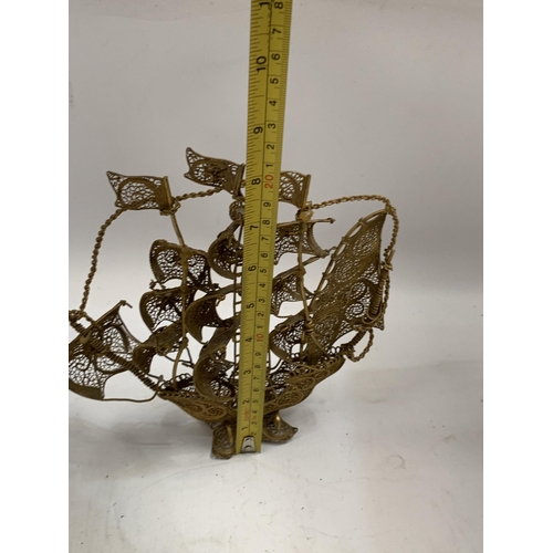 45 - AN ORNATE GILT FILIGREE MODEL OF A SAILING SHIP, HEIGHT 21CM