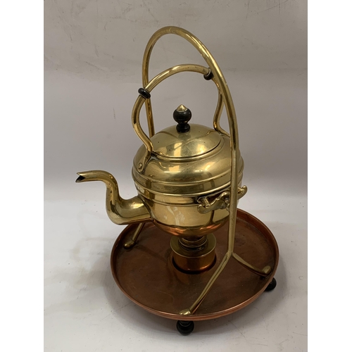 46 - A VINTAGE BRASS AND COPPER SPIRIT KETTLE