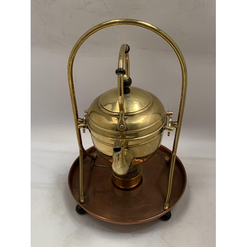 46 - A VINTAGE BRASS AND COPPER SPIRIT KETTLE