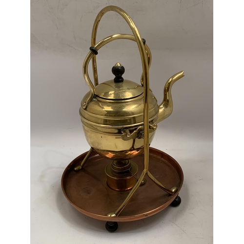 46 - A VINTAGE BRASS AND COPPER SPIRIT KETTLE