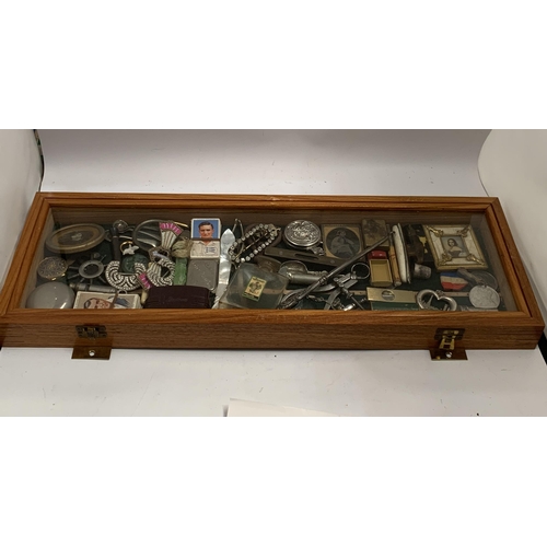 48 - A GLASS AND WOODEN DISPLAY CASE CONTAINING ASSORTED COLLECTABLES