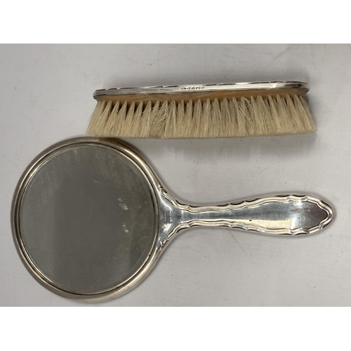 52 - A HALLMARKED SILVER AND TORTOISESHELL EFFECT HAND MIRROR AND BRUSH