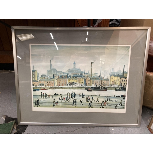 89 - A FRAMED L.S LOWRY 'NORTHERN RIVER SCENE' PRINT