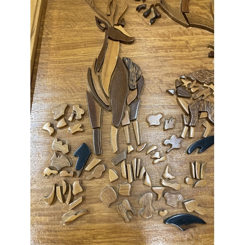 90 - A CARVED WOODEN DEER PICTURE