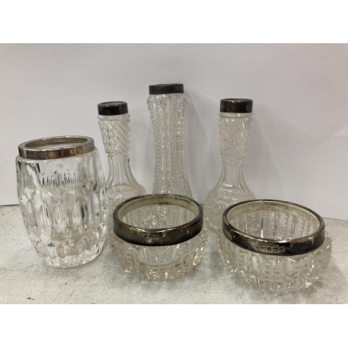 91 - A GROUP OF SILVER TOPPED AND CUT GLASS JARS AND POTS