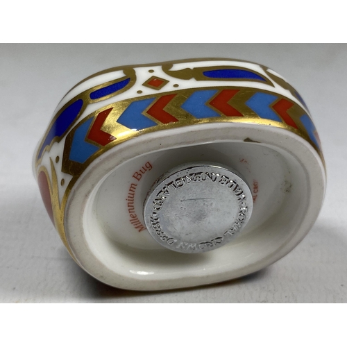 745 - A ROYAL CROWN DERBY MILLENIUM BUG, SILVER STOPPER