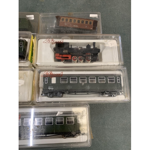 421 - ELEVEN N GAUGE LILIPUT AND EGGER-BAHN ROLLING STOCK - TWO LOCOMOTIVES, FIVE PASSENGER CARRIAGES AND ... 