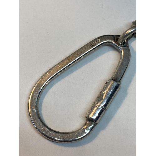 625 - A SILVER KEYRING WITH THREE VINTAGE KEYS