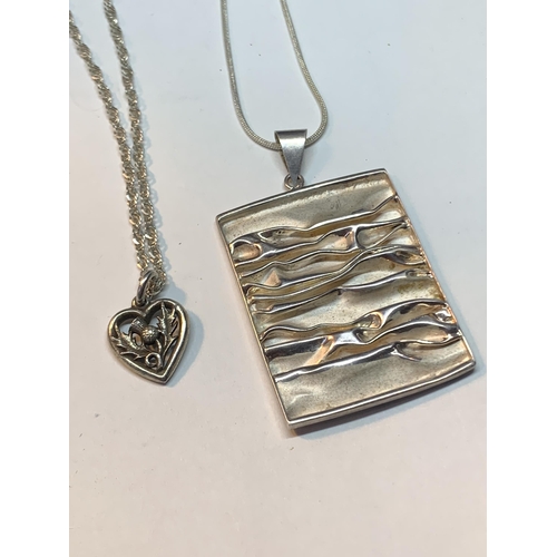 631 - FOUR SILVER NECKLACES WITH PENDANTS