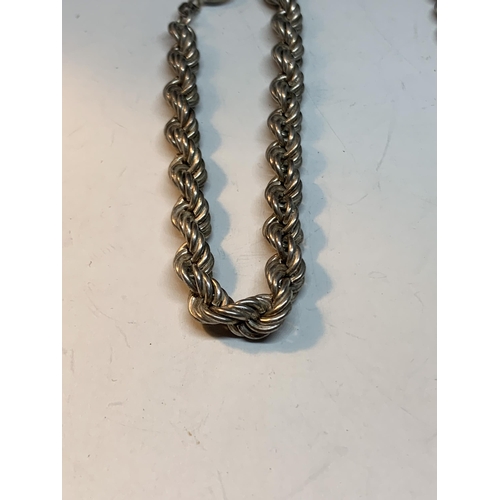 656 - A SILVER ROPE NECKLACE AND BRACELET