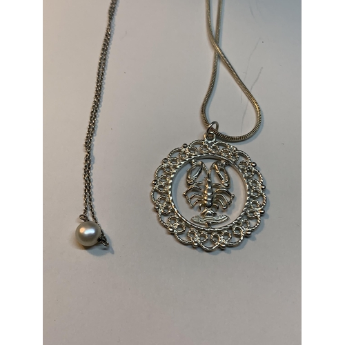 666 - FOUR SILVER NECKLACES WITH PENDANTS