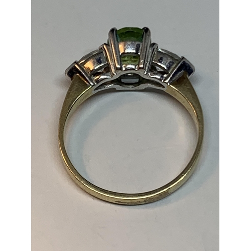 675 - A 9 CARAT GOLD RING WITH A CENTRE SQUARE EMERALD WITH A CUBIC ZIRCONIA EACH SIDE SIZE L/M