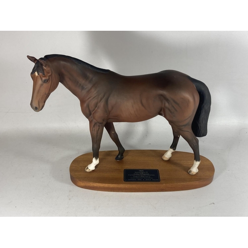 751 - A BESWICK MATT CERAMIC MODEL OF DERBY WINNING RACEHORSE TROY ON WOODEN PLINTH BASE