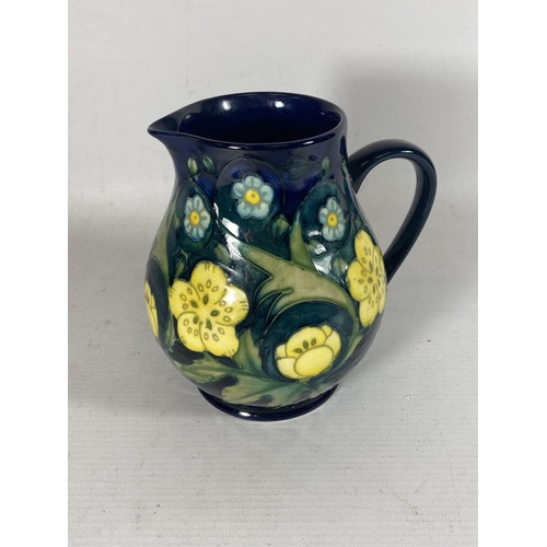 753 - A MOORCROFT POTTERY BUTTERCUP PATTERN JUG BY SALLY TUFFIN