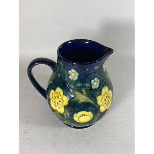 753 - A MOORCROFT POTTERY BUTTERCUP PATTERN JUG BY SALLY TUFFIN