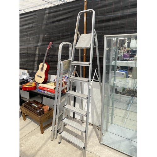 1691 - A SIX RUNG ALUMINIUM STEP LADDER AND A FURTHER FOUR RUNG ALUMINIUM STEP LADDER