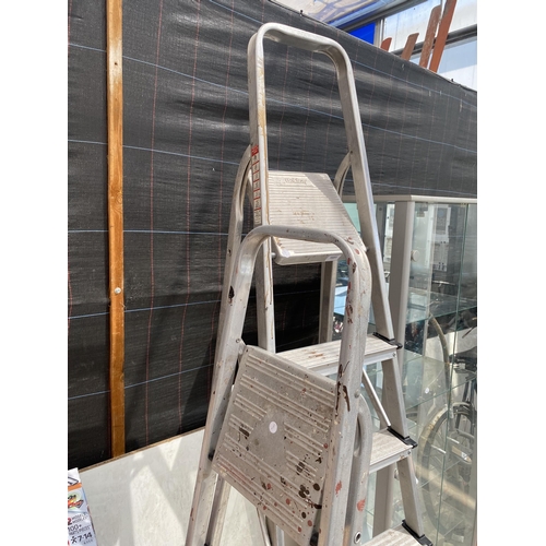 1691 - A SIX RUNG ALUMINIUM STEP LADDER AND A FURTHER FOUR RUNG ALUMINIUM STEP LADDER