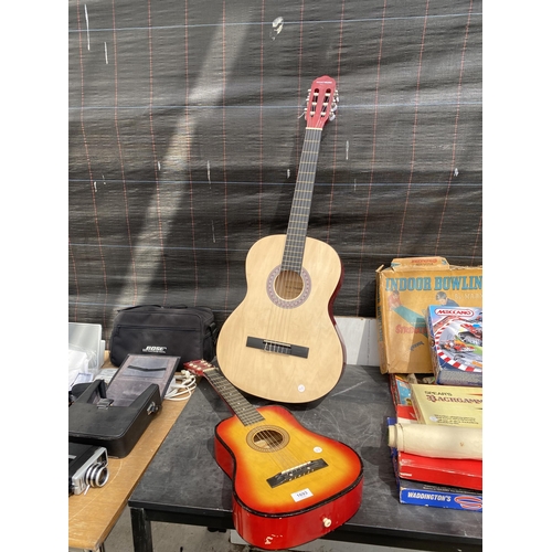 1693 - A ROCKET MUSIC ACOUSTIC GUITAR AND A FURTHER CHILDS ACOUSTIC GUITAR