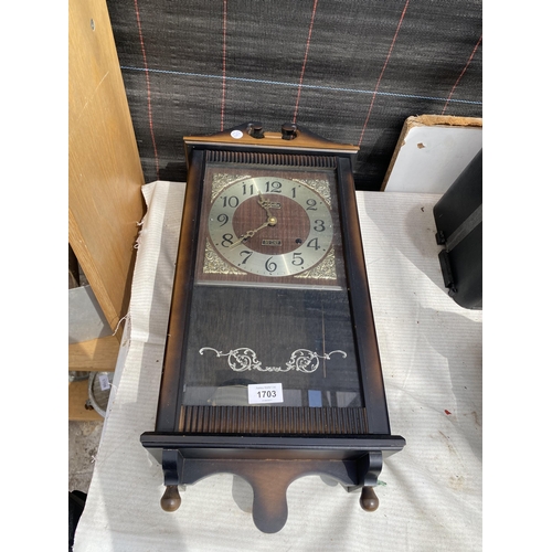 1703 - A 30 DAY CHIMING WALL CLOCK