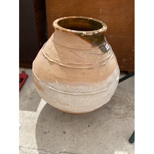 1854 - A VINTAGE TERRACOTTA AND PART GLAZED PLANTER