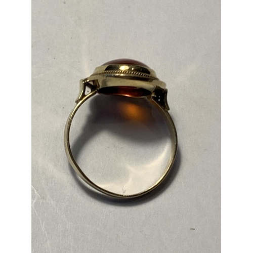 512A - A 14 CARAT GOLD RING WITH AMBER STONE SIZE N GROSS WEIGHT 2.71 GRAMS