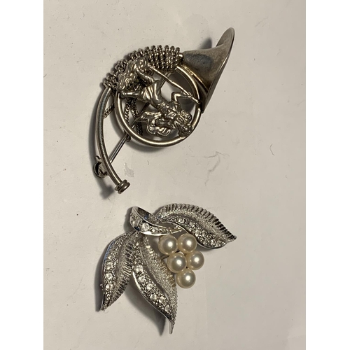 680A - FOUR VARIOUS WHITE METAL BROOCHES