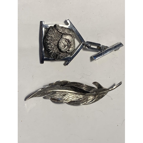 680A - FOUR VARIOUS WHITE METAL BROOCHES