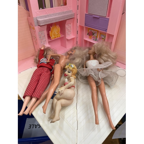 466 - A BARBIE HOUSE AND DOLLS