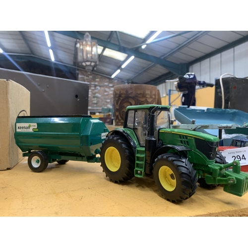 293 - AN ERTL BRITAINS JOHN DEERE TRACTOR 8191 WITH A KEENAN SYSTEM MUCK SPREADER